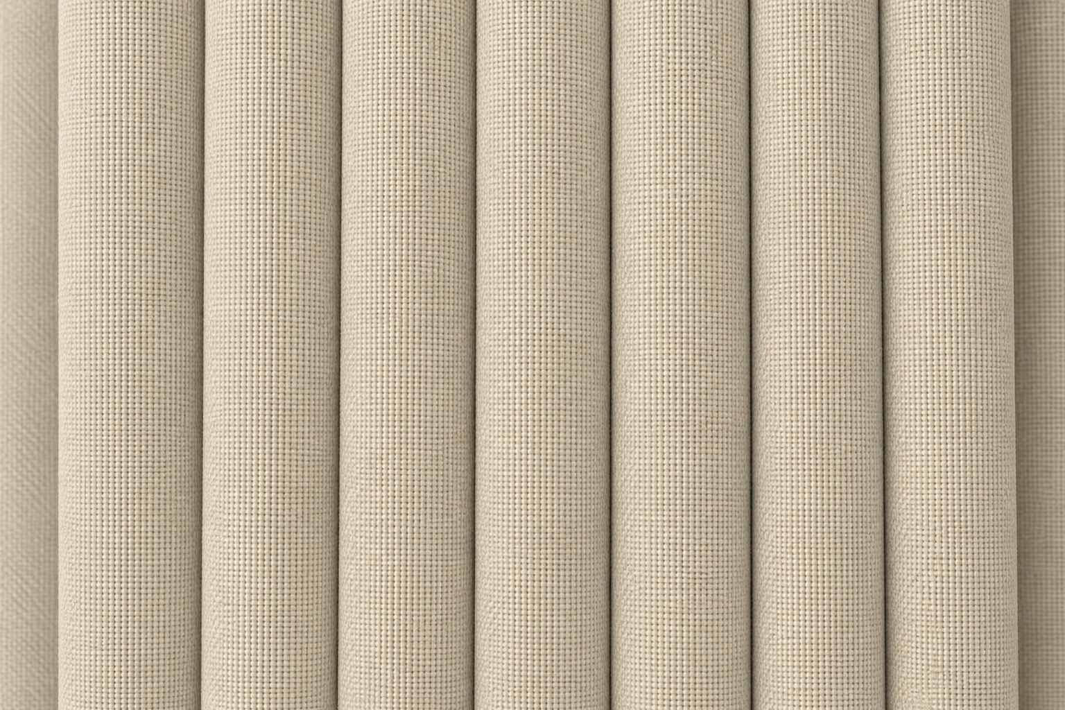 Close-up of a beige woven fabric with a textured basketweave pattern, shown in vertical folds.
